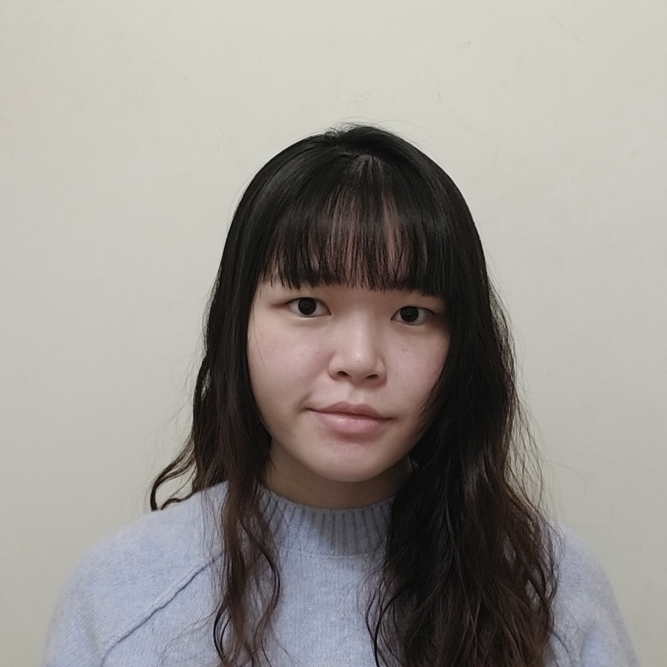 Ting Hong in front of a white background.