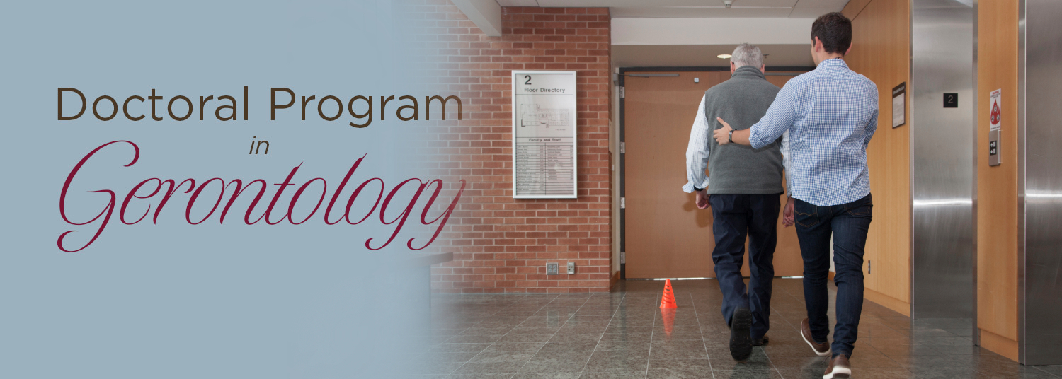 People walking through a hallway