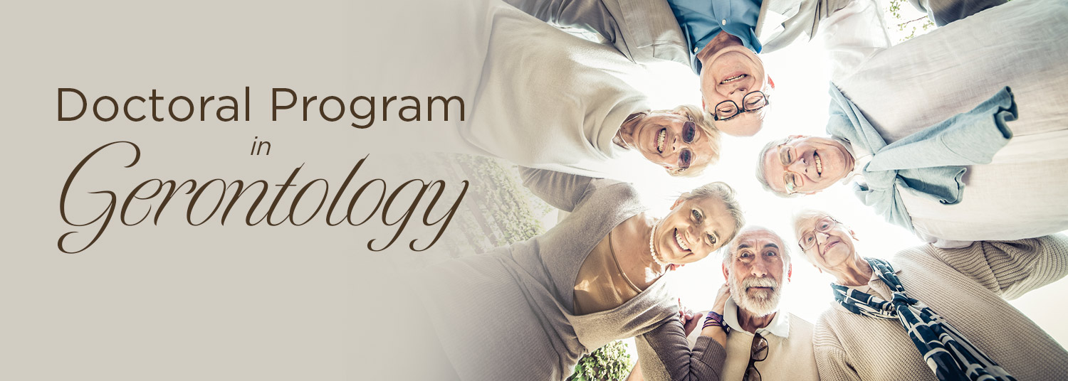 Group of elderly people hugging in a circle