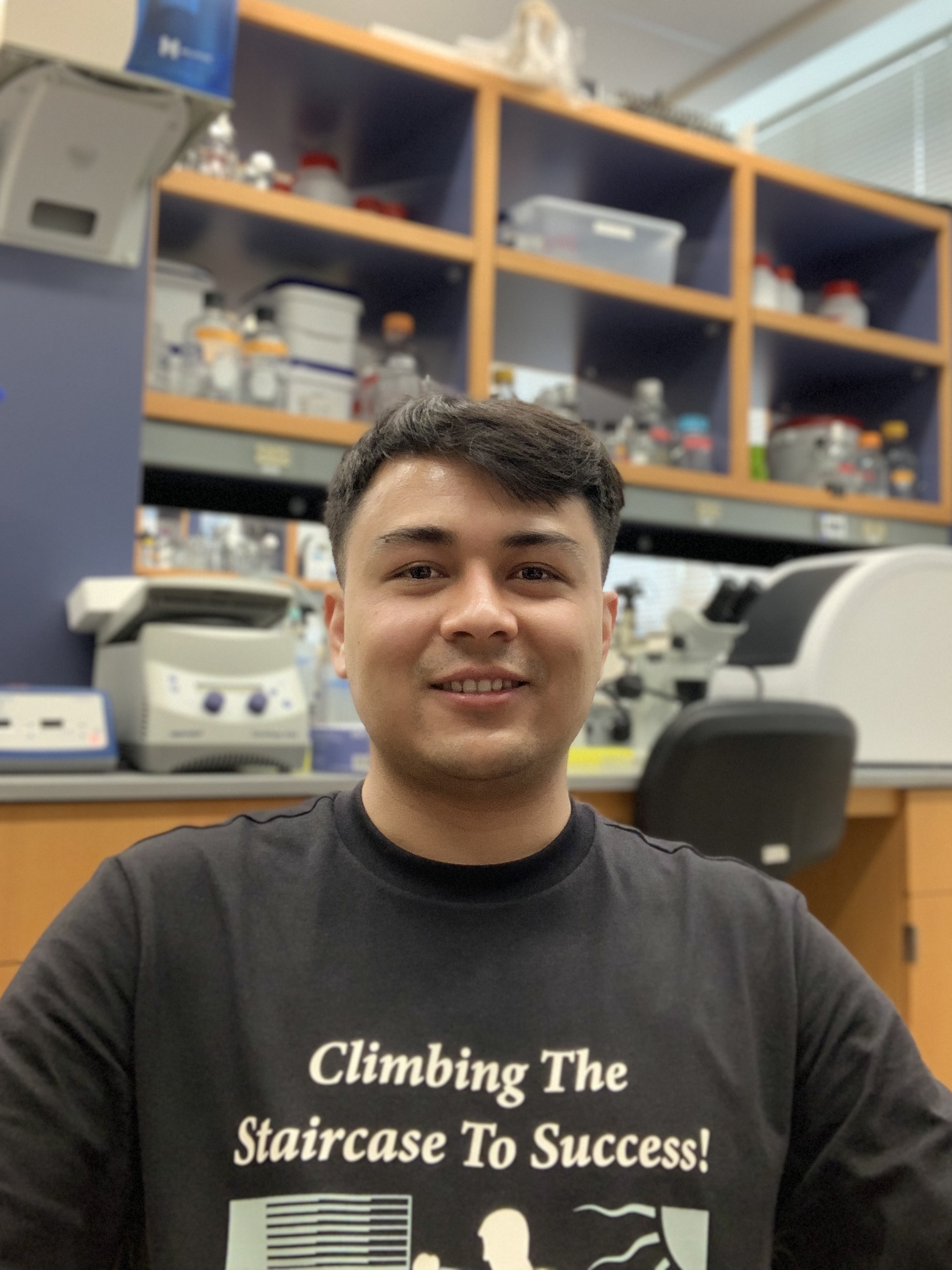 Photo of Sudeep Khadka in a lab smiling