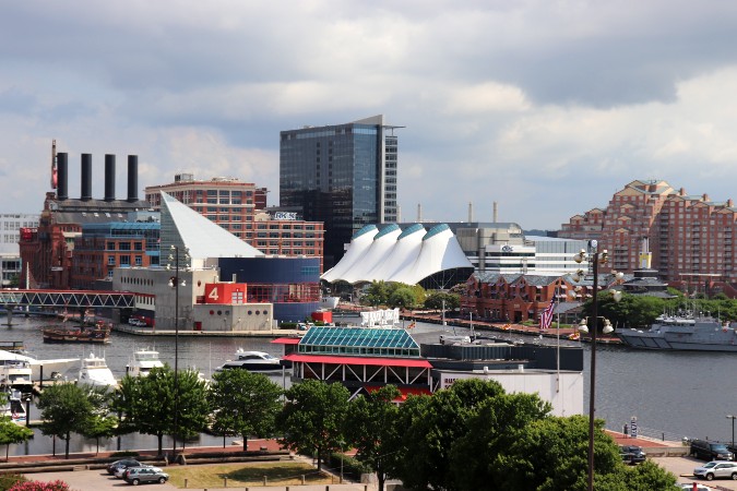 Baltimore skyline including the National Aquarium, Rusty Scupper, Legg Mason building, various boats in the Inner Harbor.